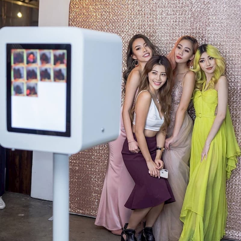 Group of girls posing at photo booth