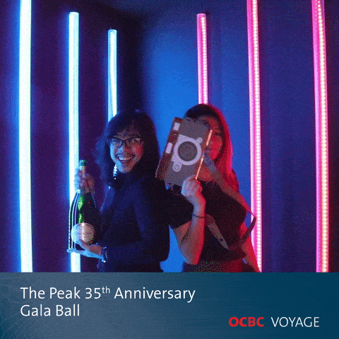 Couple with 3D props at GIF photo booth