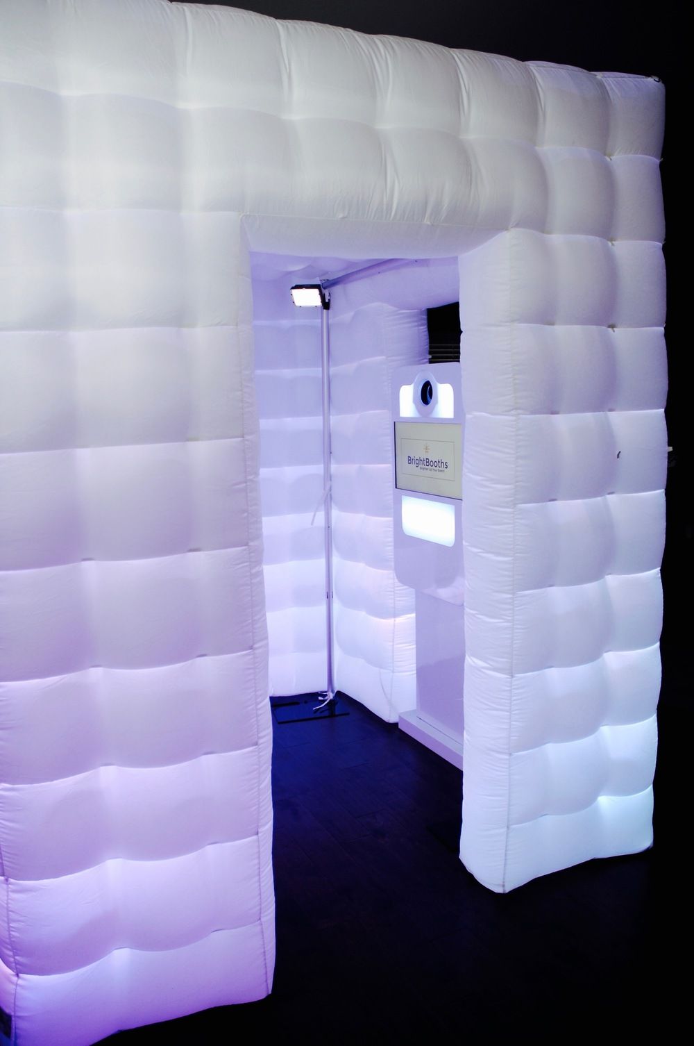 Inflatable Photobooth lighted up with instant photoshoot camera igloo at event wedding booth