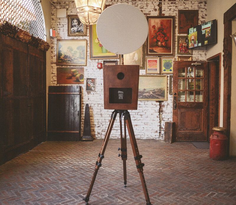 Retro or vintage style photo booth with wood exterior