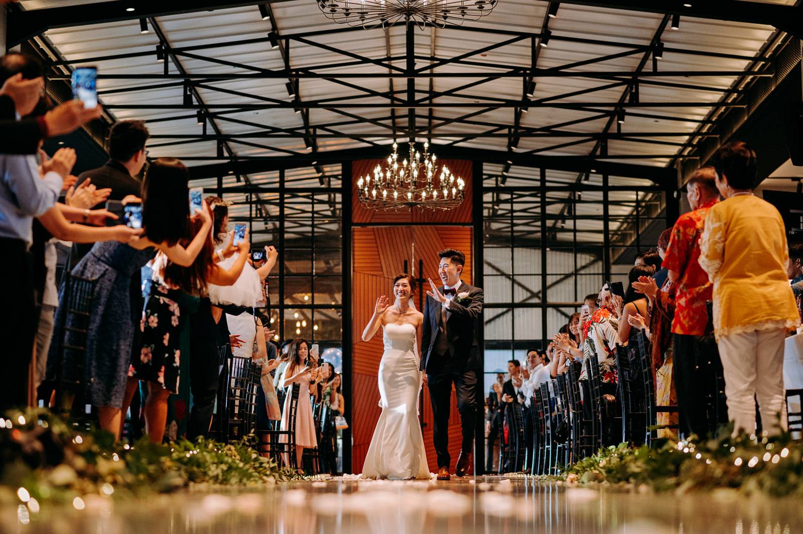 Bride and Groom couple walking the aisle at a wedding ceremony photograph by photographer ceremony