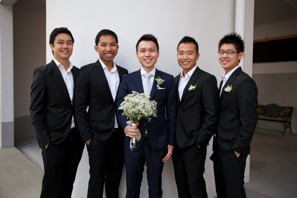 Groom and Groomsmen having photograph together by photographer wedding photography