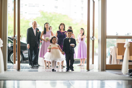 Wedding family walking in down the aisle of the ceremony photography photoshoot