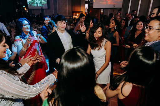 Wedding guests interacting with each other on wedding ceremony mingling event photograph photography