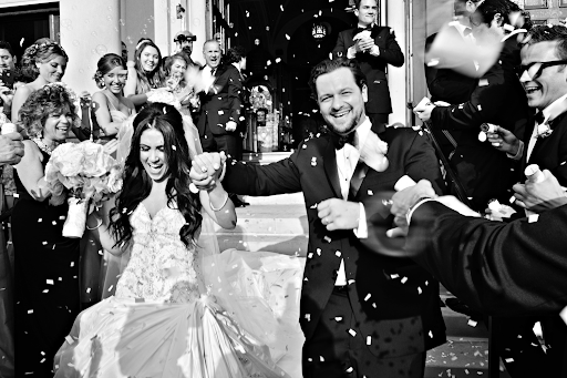 Couple celebrating ceremony at their wedding photograph photography