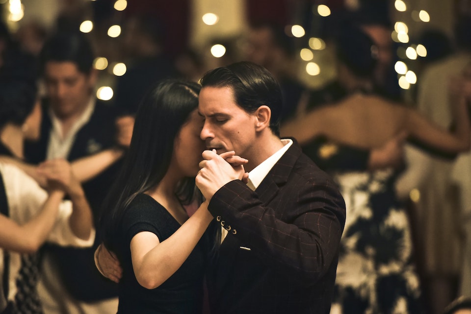 Couple dancing in ballroom